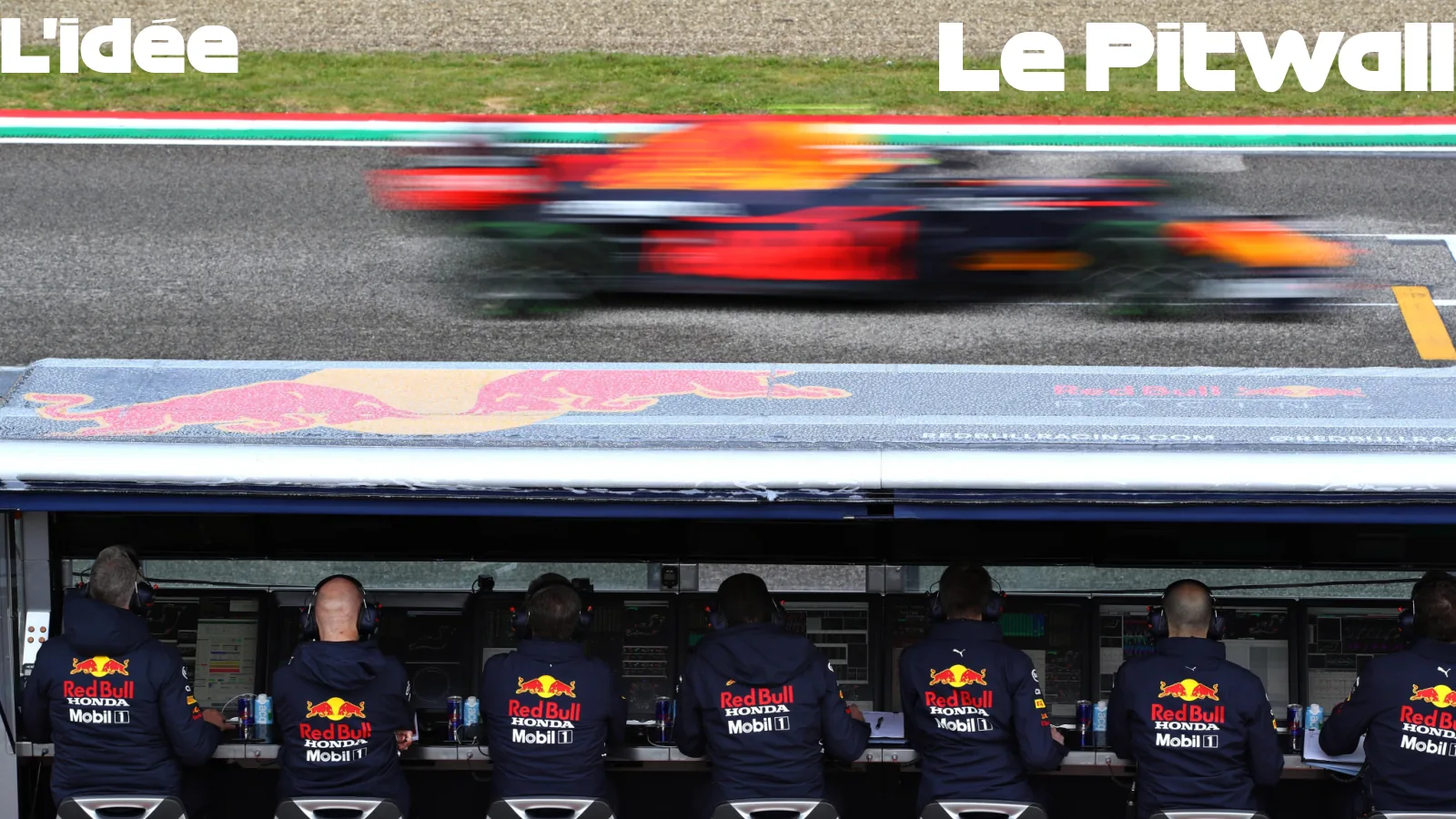 Slide: a team’s engineers on the pit wall, in front of their screens