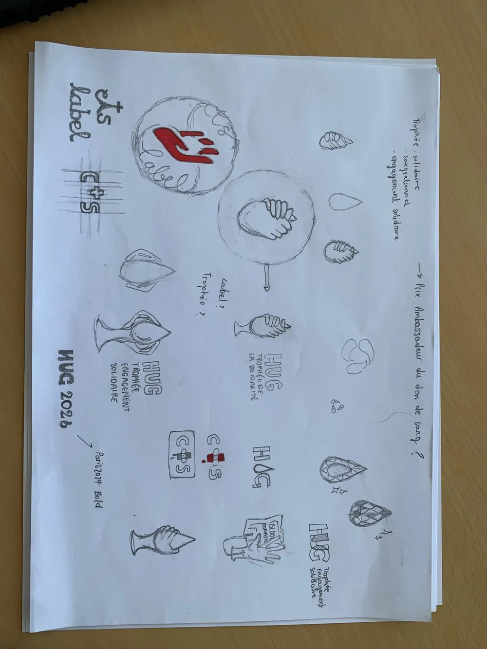 Esquisses au crayon du label et du trophée